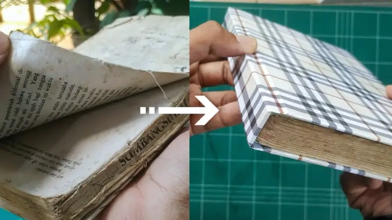buku dengan hard cover diperbaiki